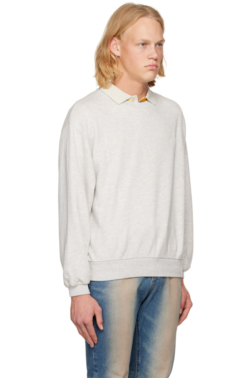 French terry sweatshirt. Rib knit crewneck, hem, and cuffs.

Supplier color: Gray melange