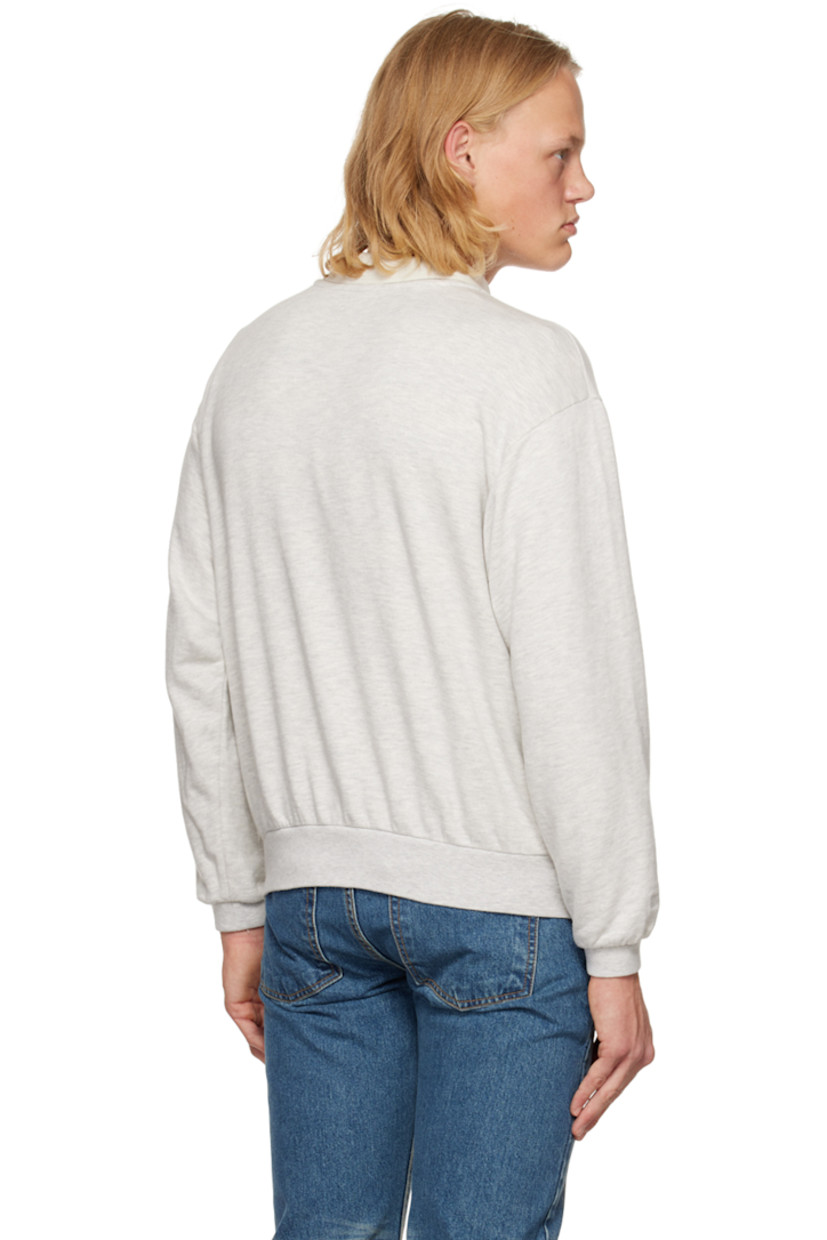 French terry sweatshirt. Rib knit crewneck, hem, and cuffs.

Supplier color: Gray melange