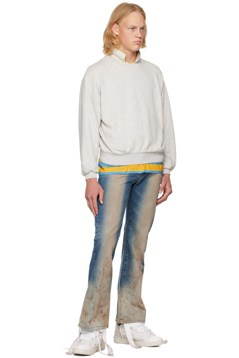 French terry sweatshirt. Rib knit crewneck, hem, and cuffs.

Supplier color: Gray melange