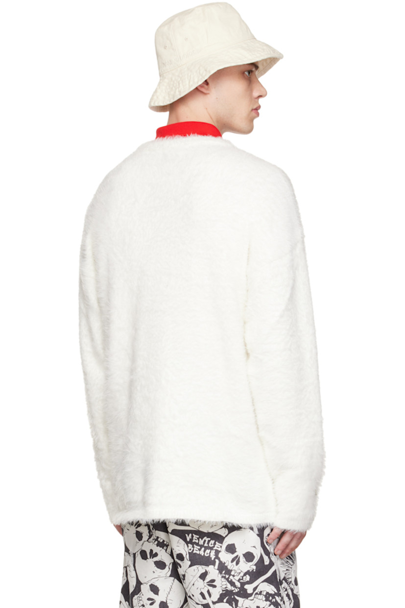 Shag knit recycled polyester-blend sweater. Rib knit V-neck, hem, and cuffs.

Supplier color: White