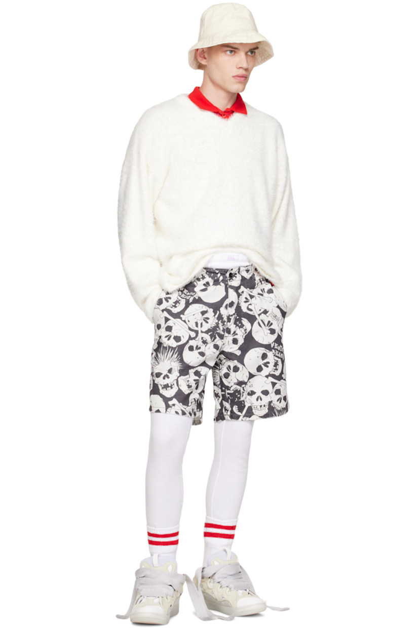 Shag knit recycled polyester-blend sweater. Rib knit V-neck, hem, and cuffs.

Supplier color: White