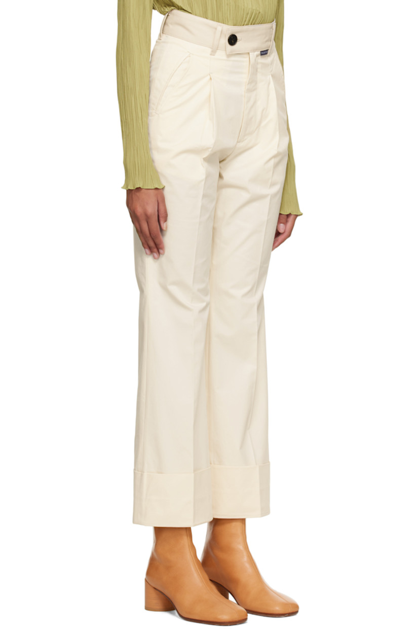 Cotton twill trousers.

· Grained faux-leather trim and belt loops at waistband
· Four-pocket styling
· Zip-fly

Supplier color: Ivory