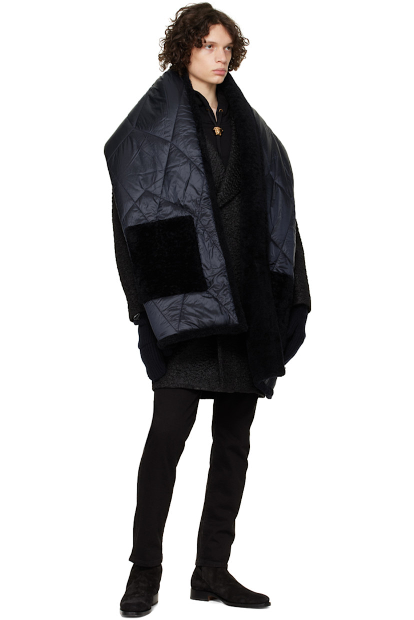 Insulated quilted nylon taffeta scarf in navy. 

· Detachable rubberized logo appliqué at face
· Patch pockets at length  
· Full shearling lining in black
· H88 x W16.5 in

Supplier color: Arctic blue