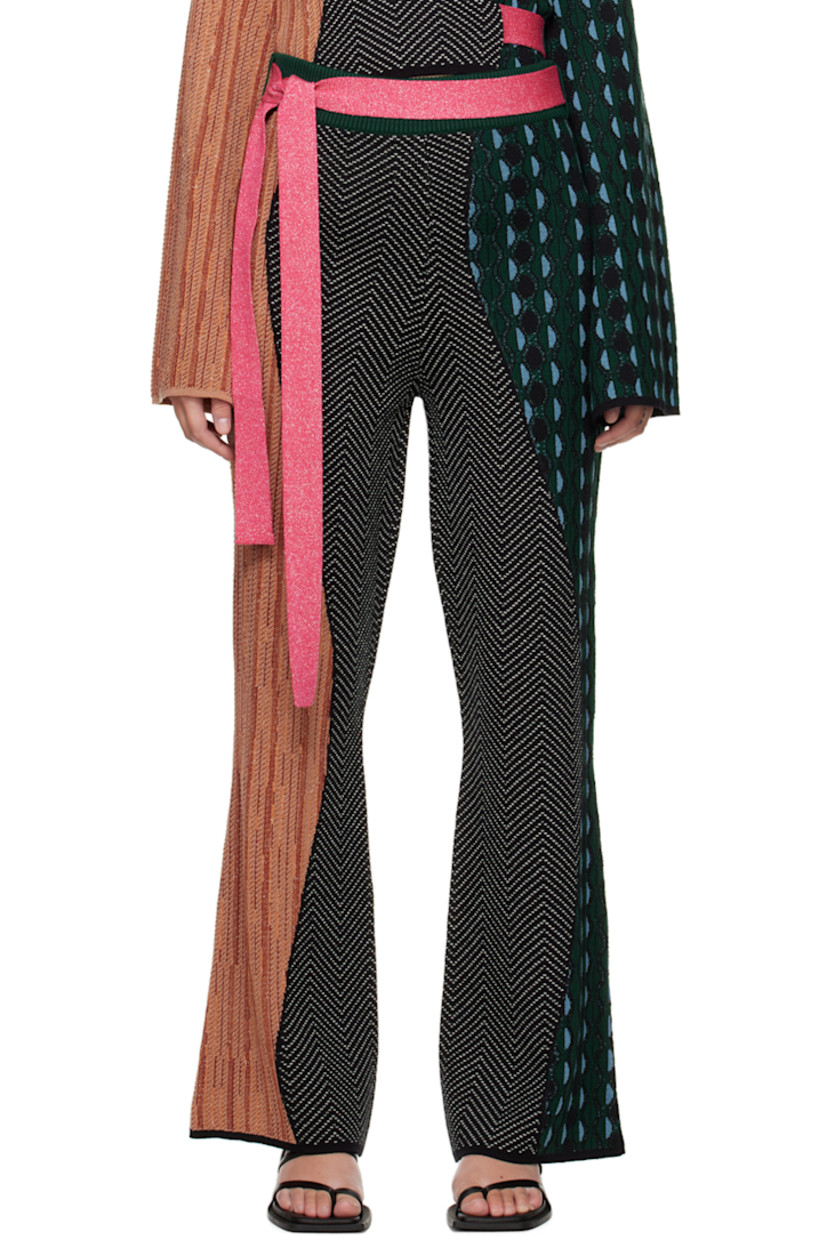 Knit merino wool lounge pants. Graphic jacquard pattern throughout.

· Detachable belt at rib knit waistband
· Belt loops

Part of the Ahluwalia x Woolmark Prize collaboration.

Supplier color: Multico green