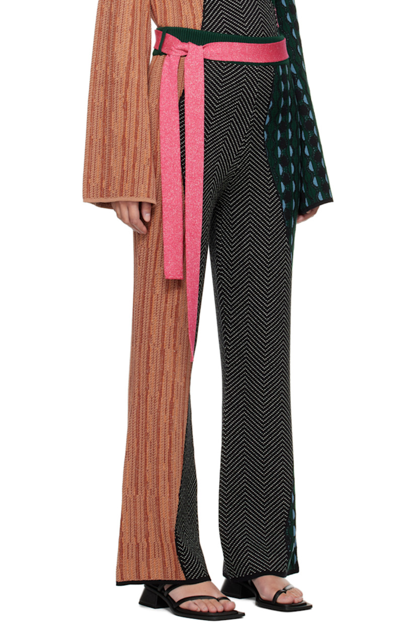 Knit merino wool lounge pants. Graphic jacquard pattern throughout.

· Detachable belt at rib knit waistband
· Belt loops

Part of the Ahluwalia x Woolmark Prize collaboration.

Supplier color: Multico green