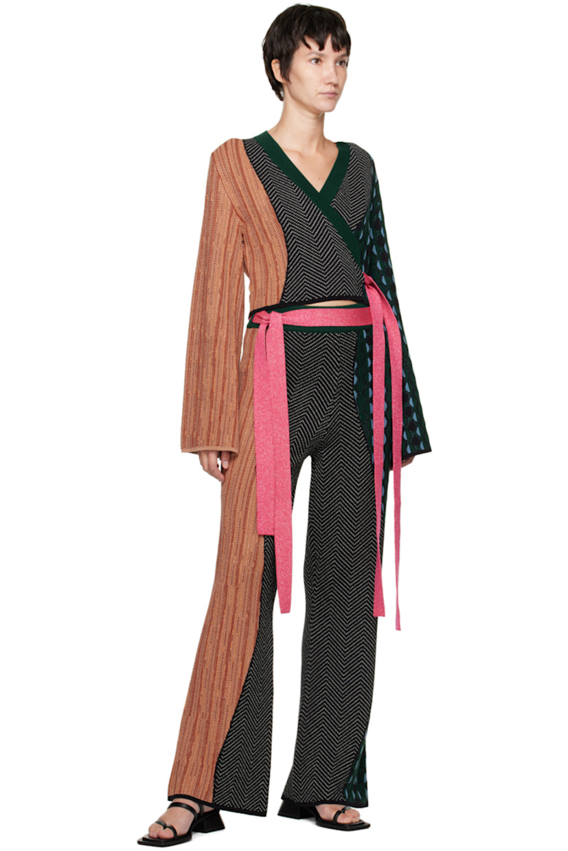 Knit merino wool lounge pants. Graphic jacquard pattern throughout.

· Detachable belt at rib knit waistband
· Belt loops

Part of the Ahluwalia x Woolmark Prize collaboration.

Supplier color: Multico green