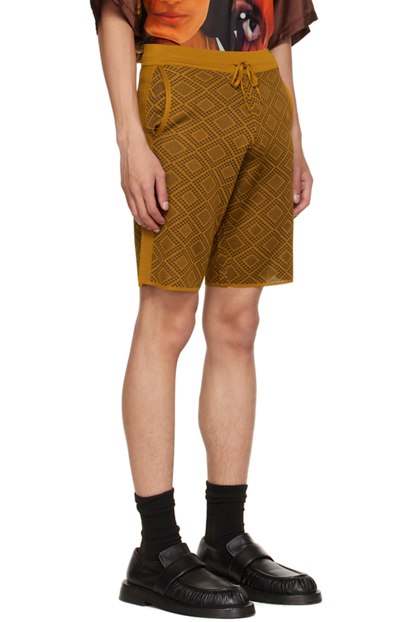 Knit viscose shorts. Jacquard graphic pattern throughout. 

· Drawstring at elasticzed wasitband 
· Two-pocket styling 
· Rib knit cuffs 

Supplier color: Multicolor brown