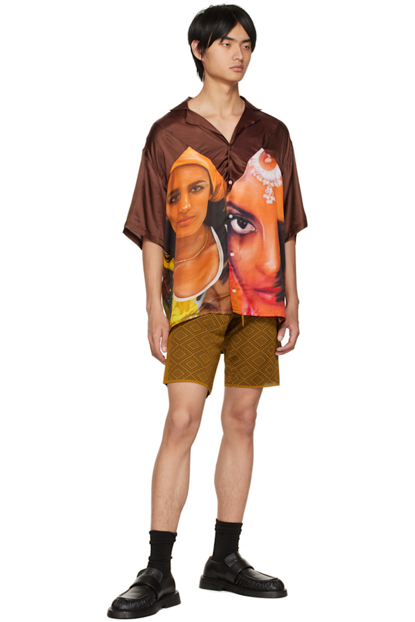 Knit viscose shorts. Jacquard graphic pattern throughout. 

· Drawstring at elasticzed wasitband 
· Two-pocket styling 
· Rib knit cuffs 

Supplier color: Multicolor brown
