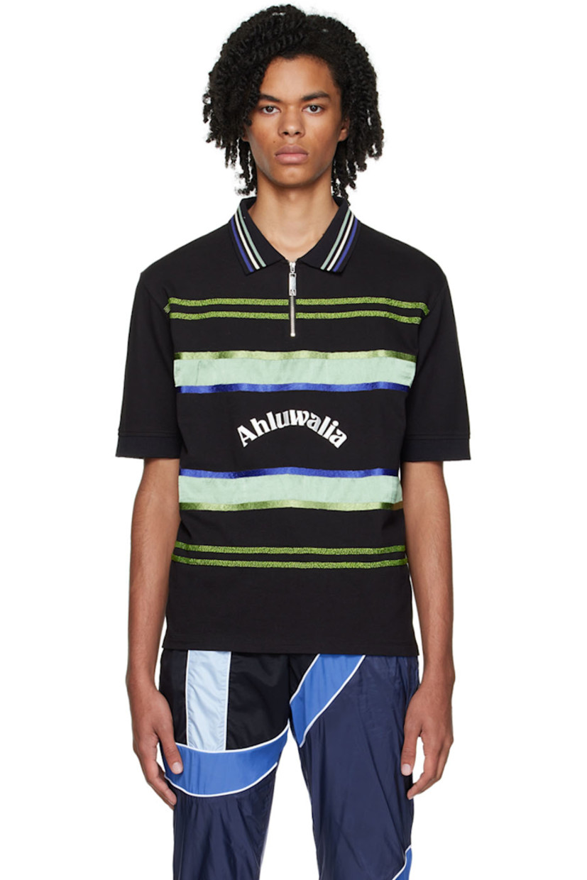 Organic cotton piqué polo. 

· Spread collar
· Half-zip closure
· Beaded detailing and satin trim at front
· Vented side seams

Supplier color: Black