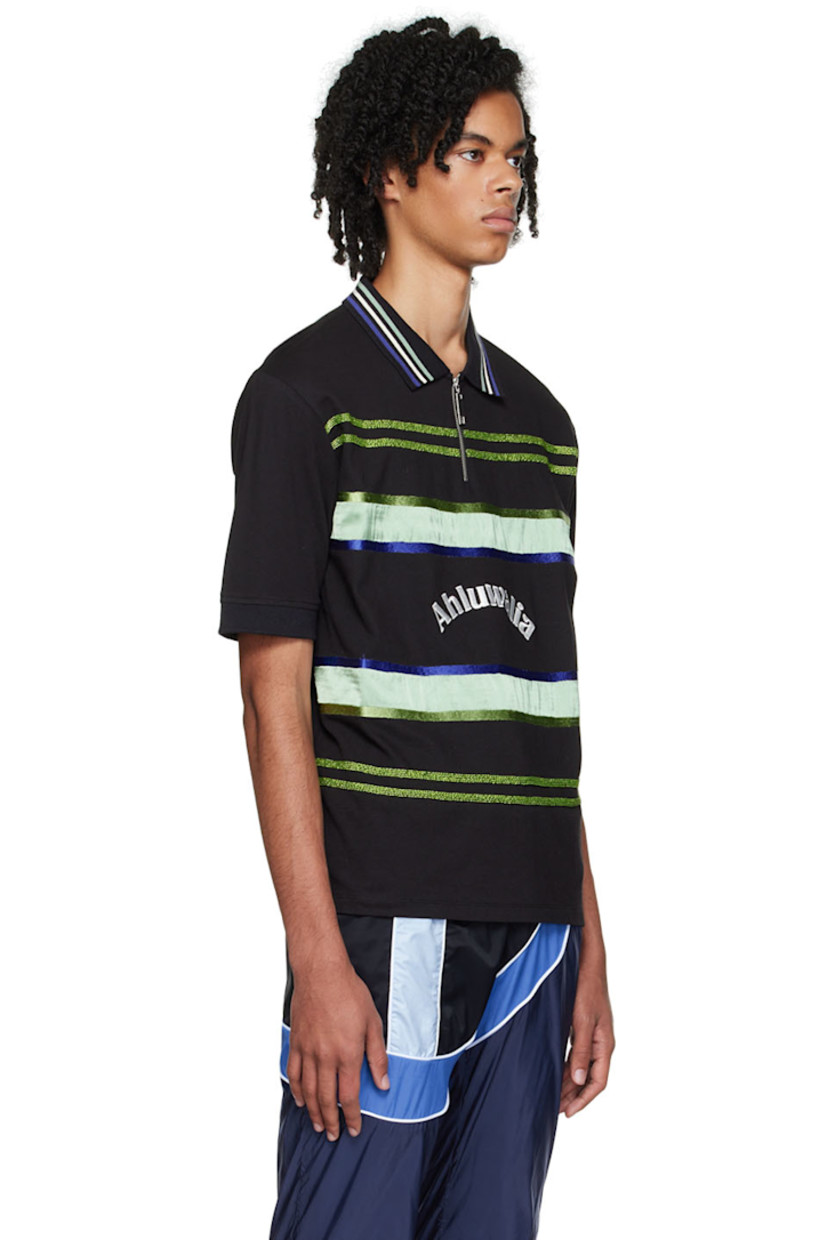 Organic cotton piqué polo. 

· Spread collar
· Half-zip closure
· Beaded detailing and satin trim at front
· Vented side seams

Supplier color: Black