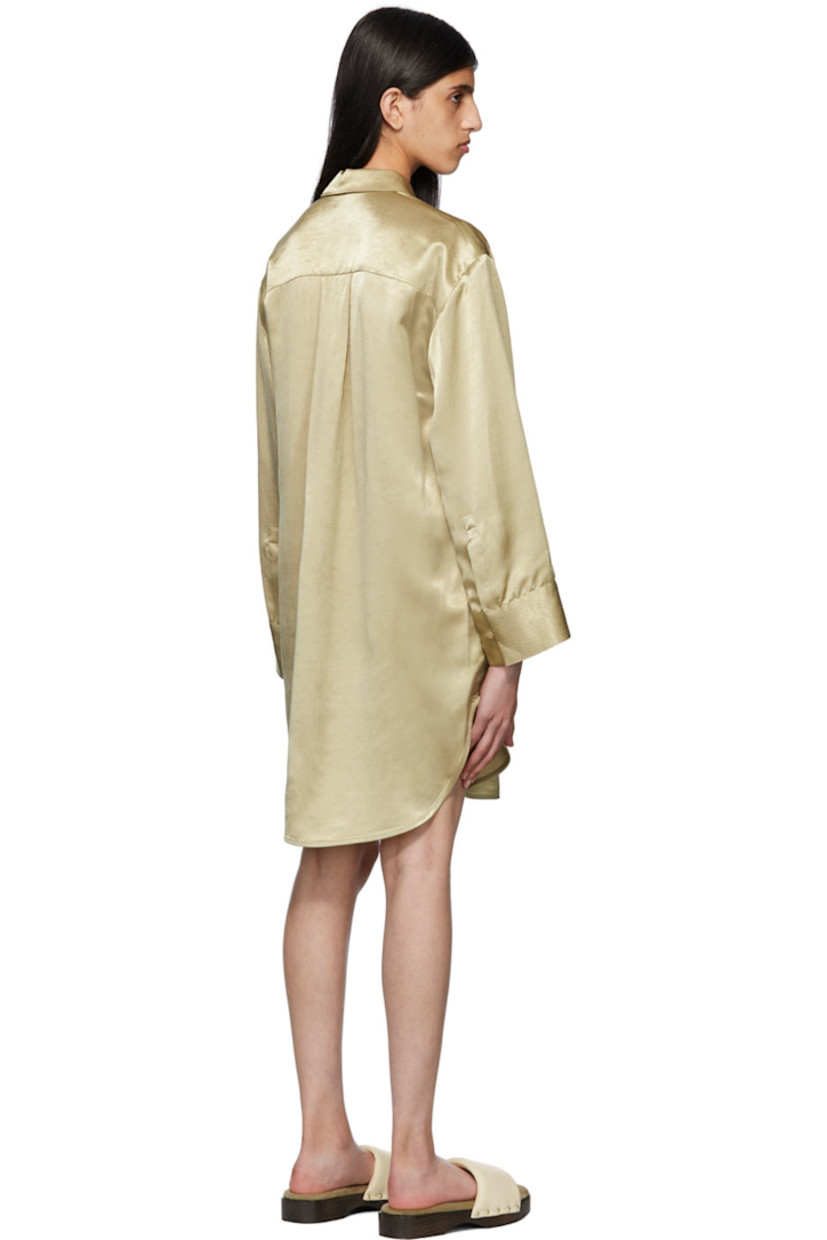 Viscose crepe dress.

· Spread collar
· Button closure
· Patch pocket
· Single-button barrel cuffs
· Shirttail hem

Supplier color: Nature