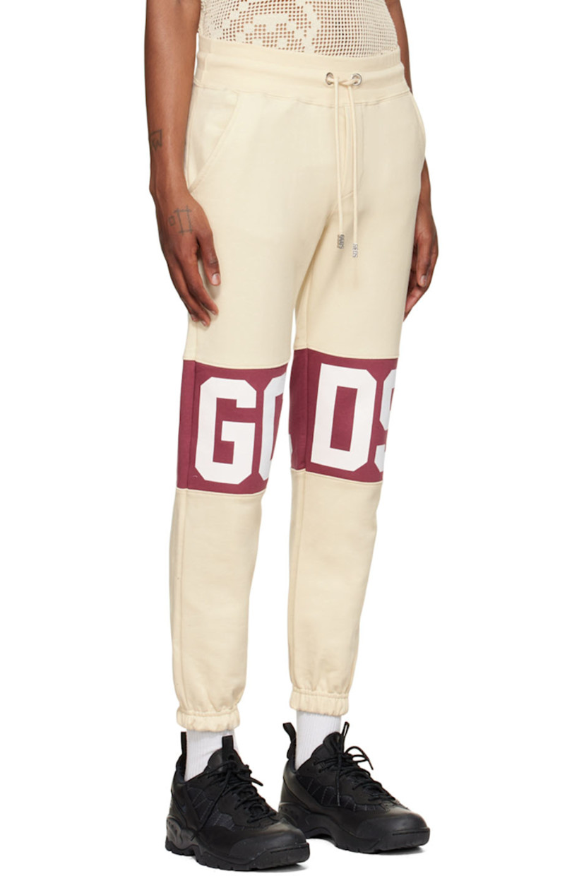French terry lounge pants.

· Paneled construction
· Drawstring at elasticized waistband
· Three-pocket styling
· Mock-fly
· Logo printed at legs
· Logo flag at side seam
· Elasticized cuffs

Supplier color: Bordeaux