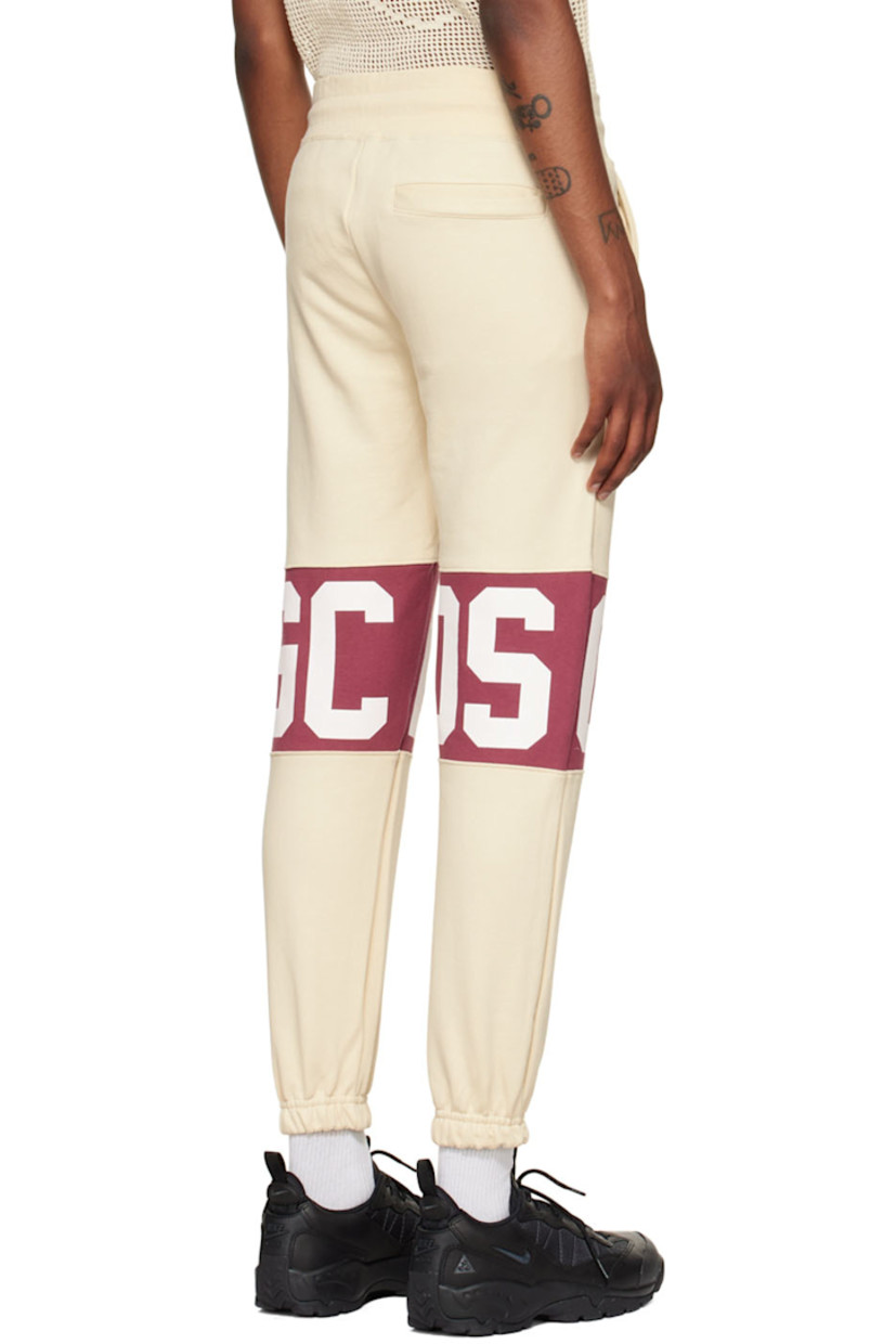 French terry lounge pants.

· Paneled construction
· Drawstring at elasticized waistband
· Three-pocket styling
· Mock-fly
· Logo printed at legs
· Logo flag at side seam
· Elasticized cuffs

Supplier color: Bordeaux