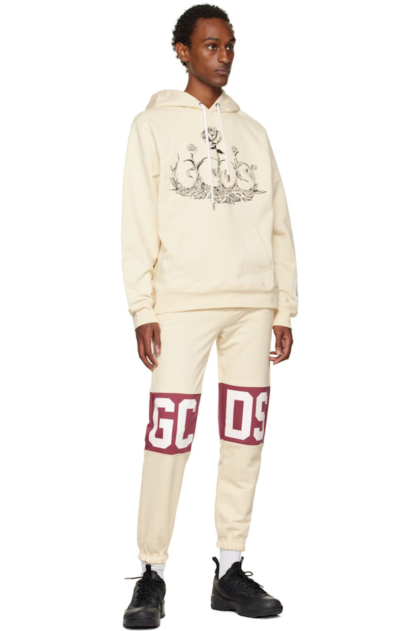 French terry lounge pants.

· Paneled construction
· Drawstring at elasticized waistband
· Three-pocket styling
· Mock-fly
· Logo printed at legs
· Logo flag at side seam
· Elasticized cuffs

Supplier color: Bordeaux