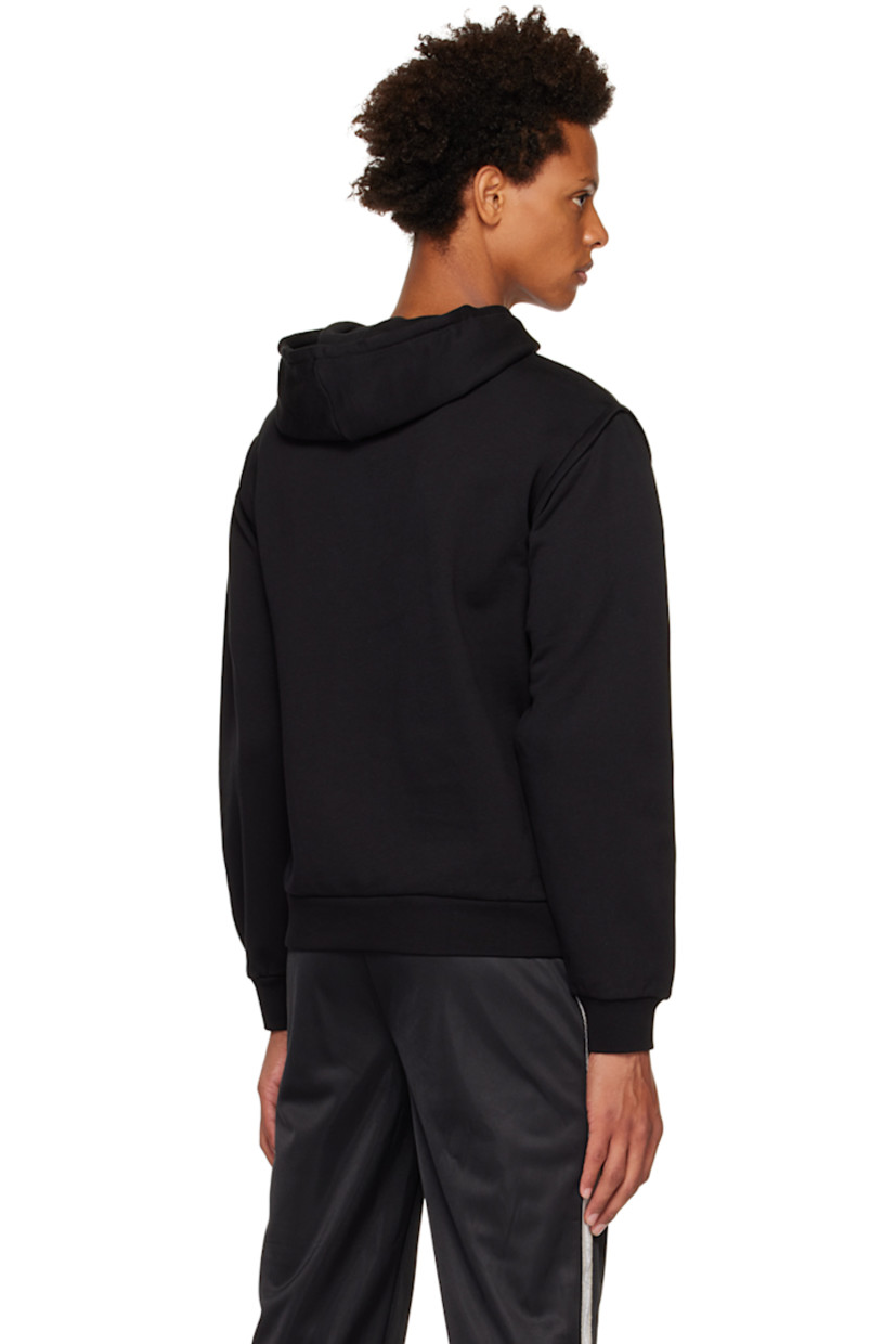 Paneled French terry hoodie. Detachable zip sleeves for alternate styling.

· Bungee-style drawstring at hood
· Logo embroidered at chest
· Kangaroo pocket
· Rib knit hem and cuffs

Supplier color: Black