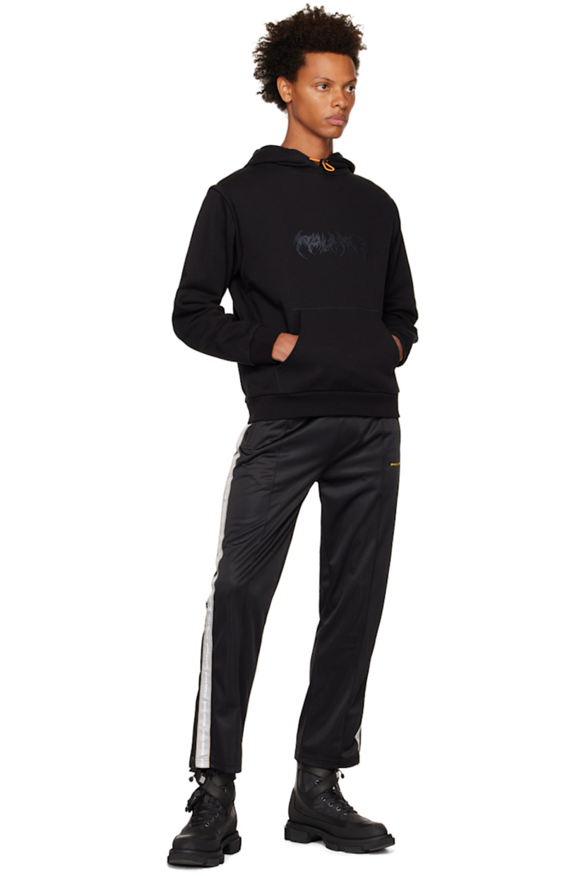 Paneled French terry hoodie. Detachable zip sleeves for alternate styling.

· Bungee-style drawstring at hood
· Logo embroidered at chest
· Kangaroo pocket
· Rib knit hem and cuffs

Supplier color: Black