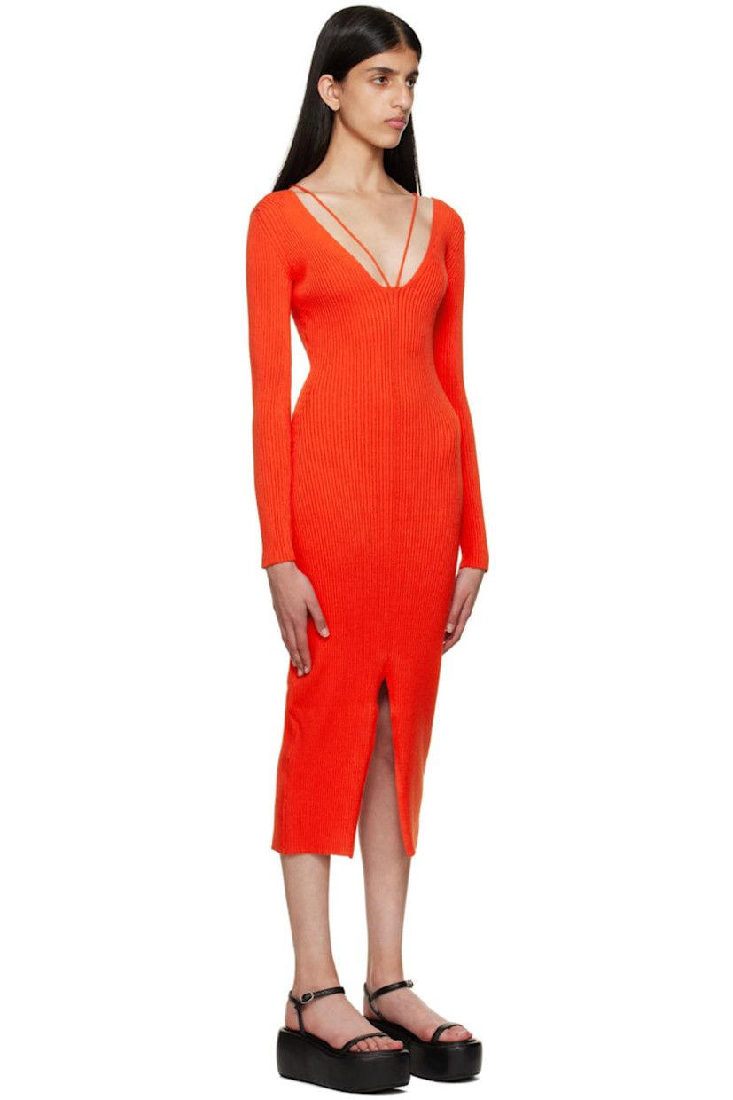 Stretch rib knit Ecovero™ viscose and polyester-blend dress. 

· V-neck
· Halter straps 
· V-neck at back 
· Central vent at front hem and back hem 

Supplier color: Red