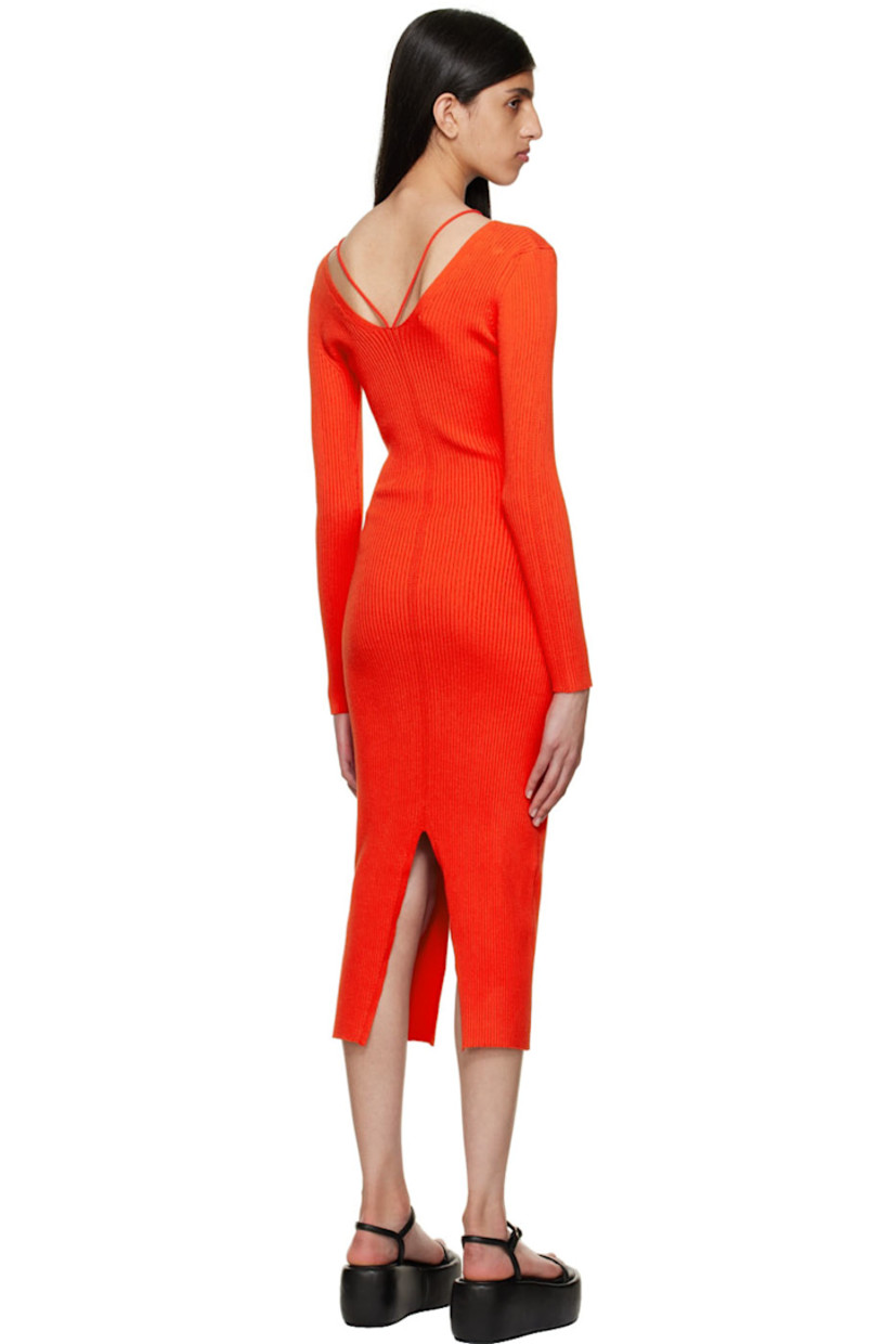 Stretch rib knit Ecovero™ viscose and polyester-blend dress. 

· V-neck
· Halter straps 
· V-neck at back 
· Central vent at front hem and back hem 

Supplier color: Red