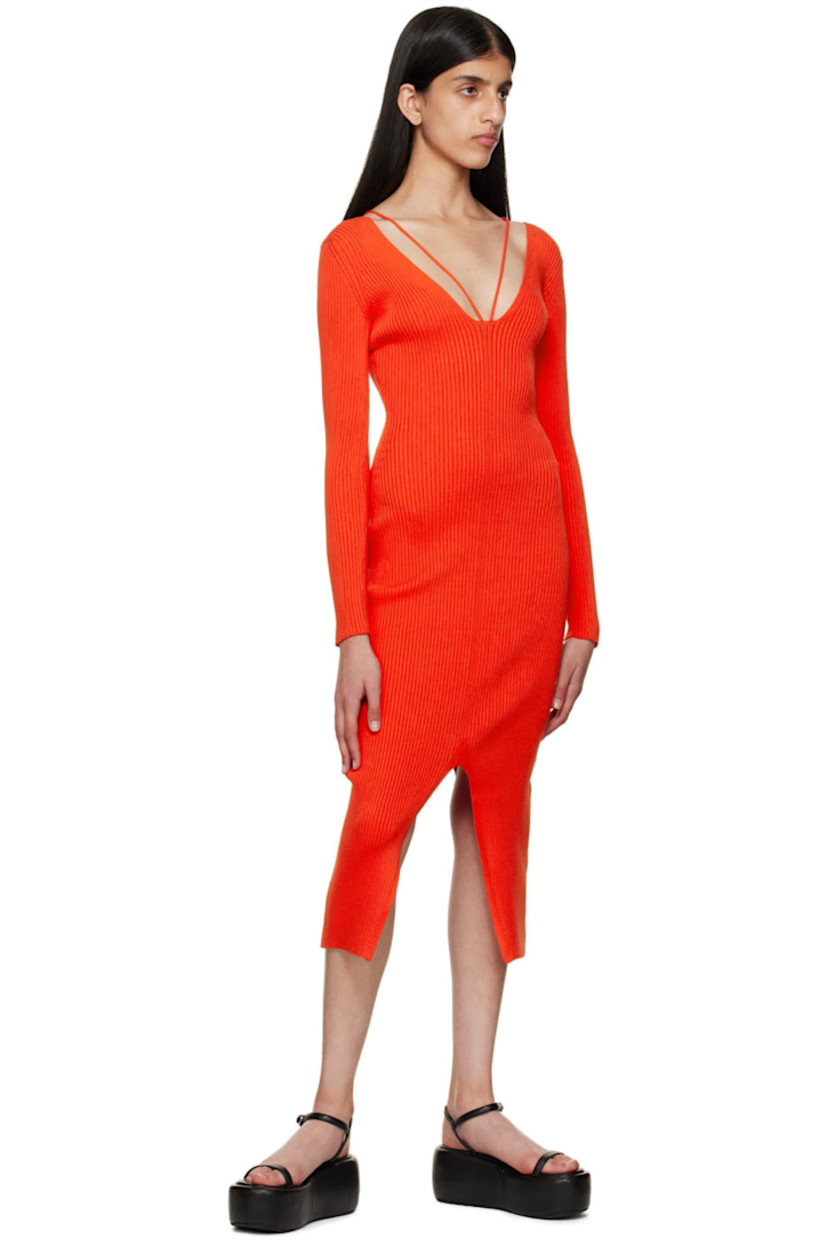 Stretch rib knit Ecovero™ viscose and polyester-blend dress. 

· V-neck
· Halter straps 
· V-neck at back 
· Central vent at front hem and back hem 

Supplier color: Red