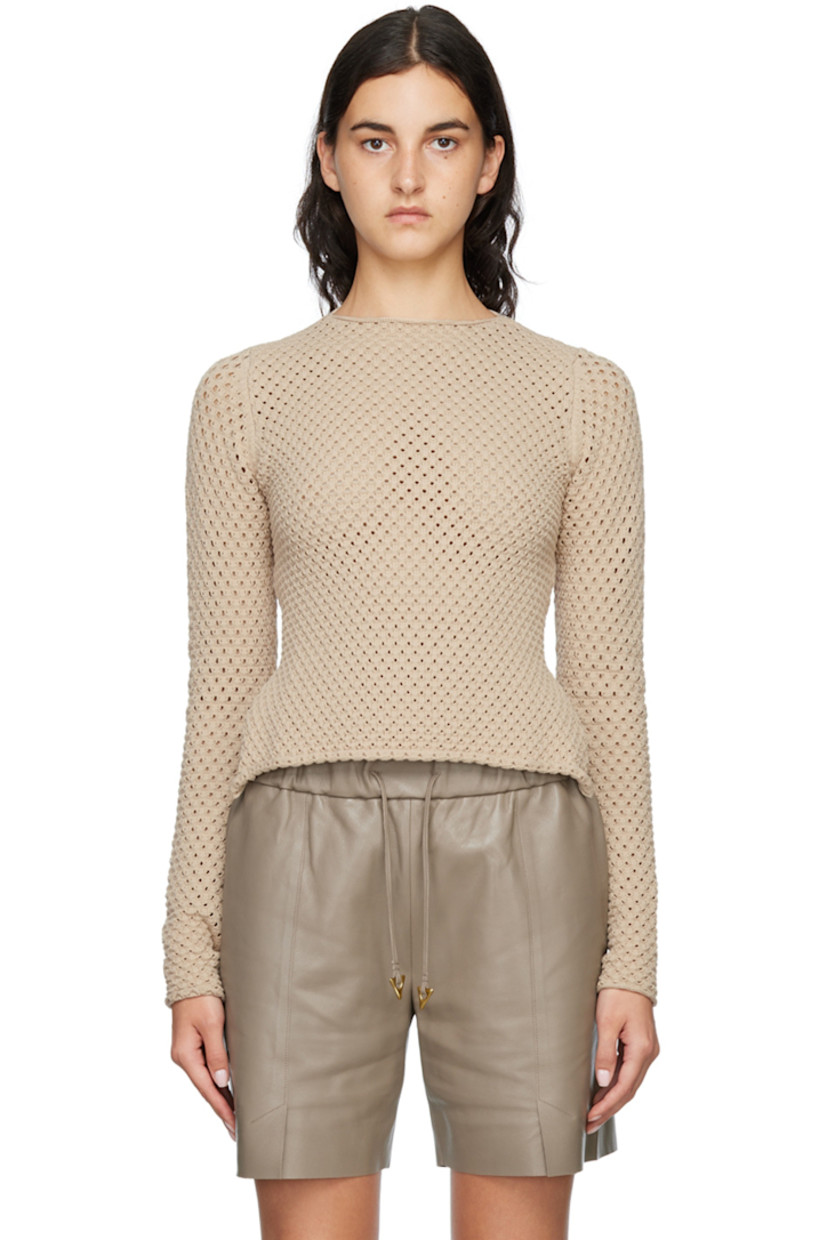 Knit stretch Ecovero™ viscose and polyester-blend sweater. 

· Rolled edge at crewneck, cuffs, and hem
· Cutout at back
· Hand-crocheted strap at back 
· Logo plaque at back 

Supplier color: Sand