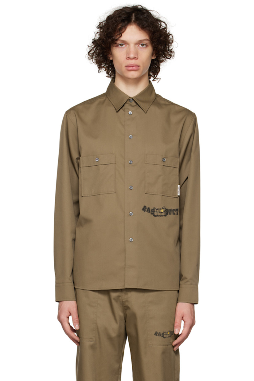 Cotton and polyester-blend twill shirt. 

· Spread collar
· Button closure 
· Flap pockets
· Textile logo patch at chest
· Logo graphic printed at front and back 
· Two-button barrel cuffs

Supplier color: Light Khaki