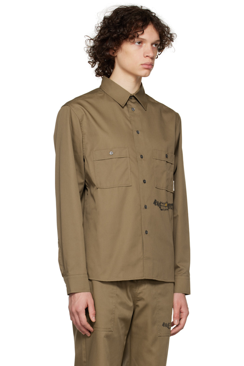 Cotton and polyester-blend twill shirt. 

· Spread collar
· Button closure 
· Flap pockets
· Textile logo patch at chest
· Logo graphic printed at front and back 
· Two-button barrel cuffs

Supplier color: Light Khaki