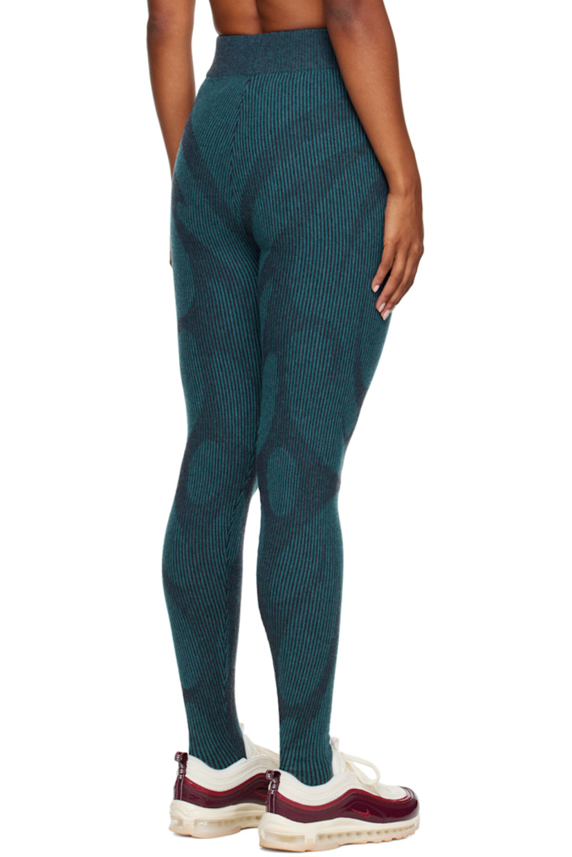 Rib knit virgin wool leggings. Graphic knit throughout. 

· Elasticized waistband 
· Stirrup at cuffs 

Supplier color: Azure/Charcoal