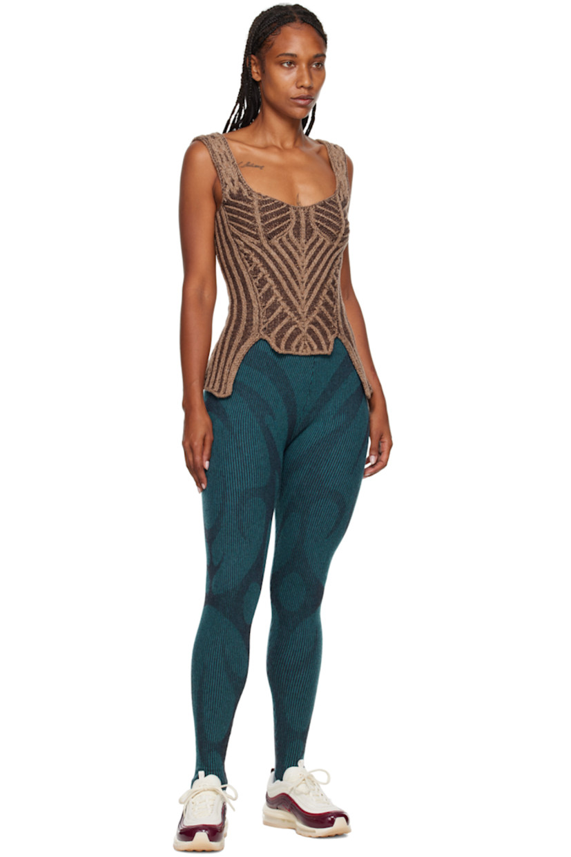 Rib knit virgin wool leggings. Graphic knit throughout. 

· Elasticized waistband 
· Stirrup at cuffs 

Supplier color: Azure/Charcoal