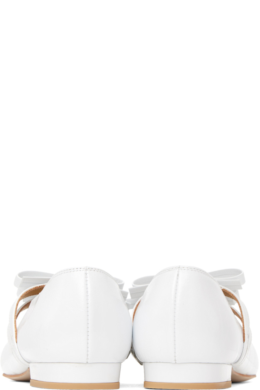 Crinkled leather ballerina flats in white.

· Pointed toe
· Twin bow accents at vamp 
· Leather and suede lining in brown 
· Covered leather heel with rubber injection
· Leather outsole in beige 

Supplier color: White crinkle
