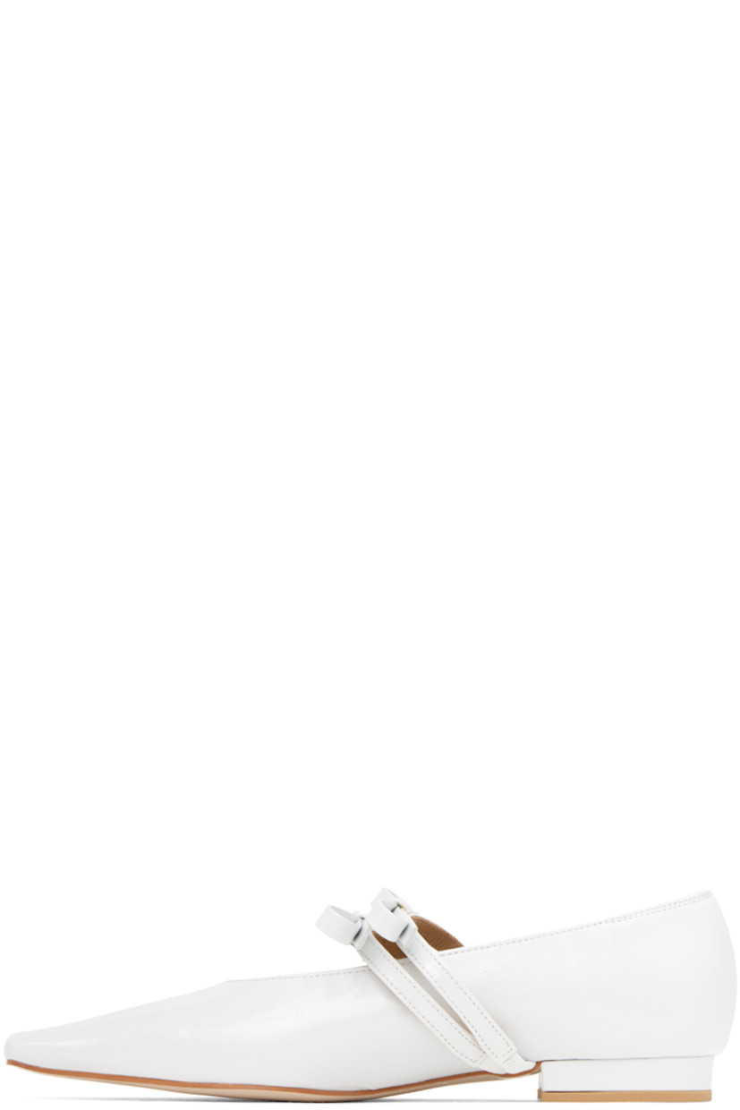 Crinkled leather ballerina flats in white.

· Pointed toe
· Twin bow accents at vamp 
· Leather and suede lining in brown 
· Covered leather heel with rubber injection
· Leather outsole in beige 

Supplier color: White crinkle