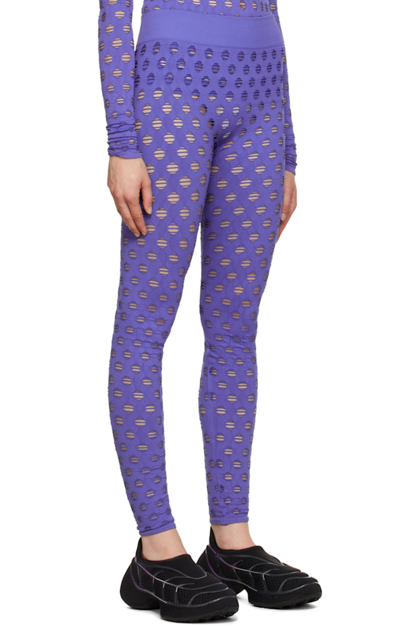 Semi-sheer stretch nylon jersey leggings.

· Perforated detailing throughout
· Rib knit elasticized waistband

Supplier color: Midnight
