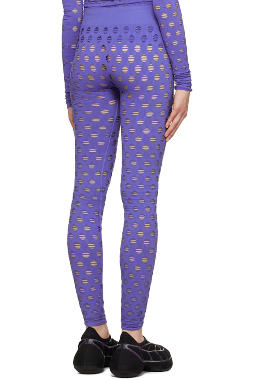 Semi-sheer stretch nylon jersey leggings.

· Perforated detailing throughout
· Rib knit elasticized waistband

Supplier color: Midnight