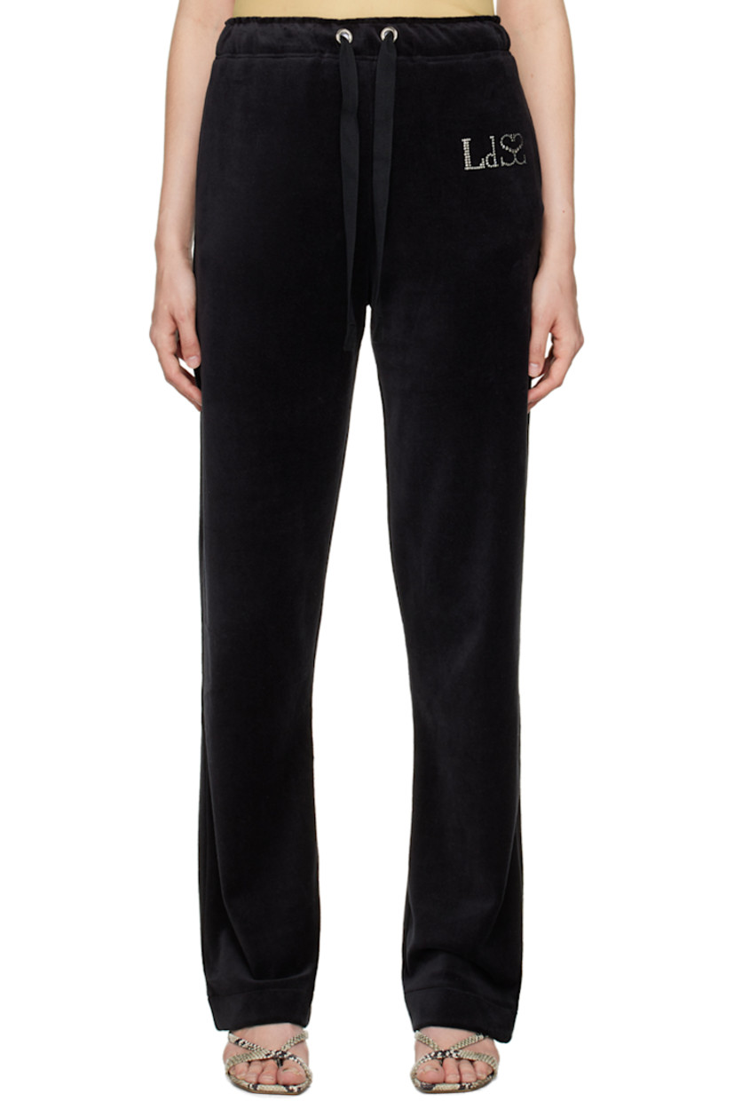 Polyester velour lounge pants.

· Drawstring at elasticized waistband
· Four-pocket styling
· Crystal-cut logo appliqué at front
· Metal eyelet vents at back

Supplier color: Black