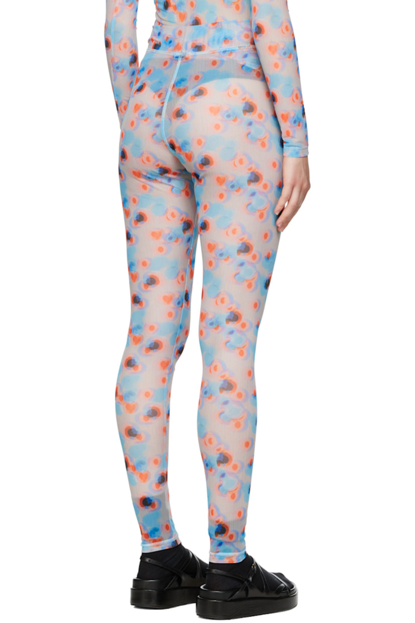 Semi-sheer stretch recycled polyester mesh leggings. Graphic pattern printed throughout.

Supplier color: Dots orange/Lavender