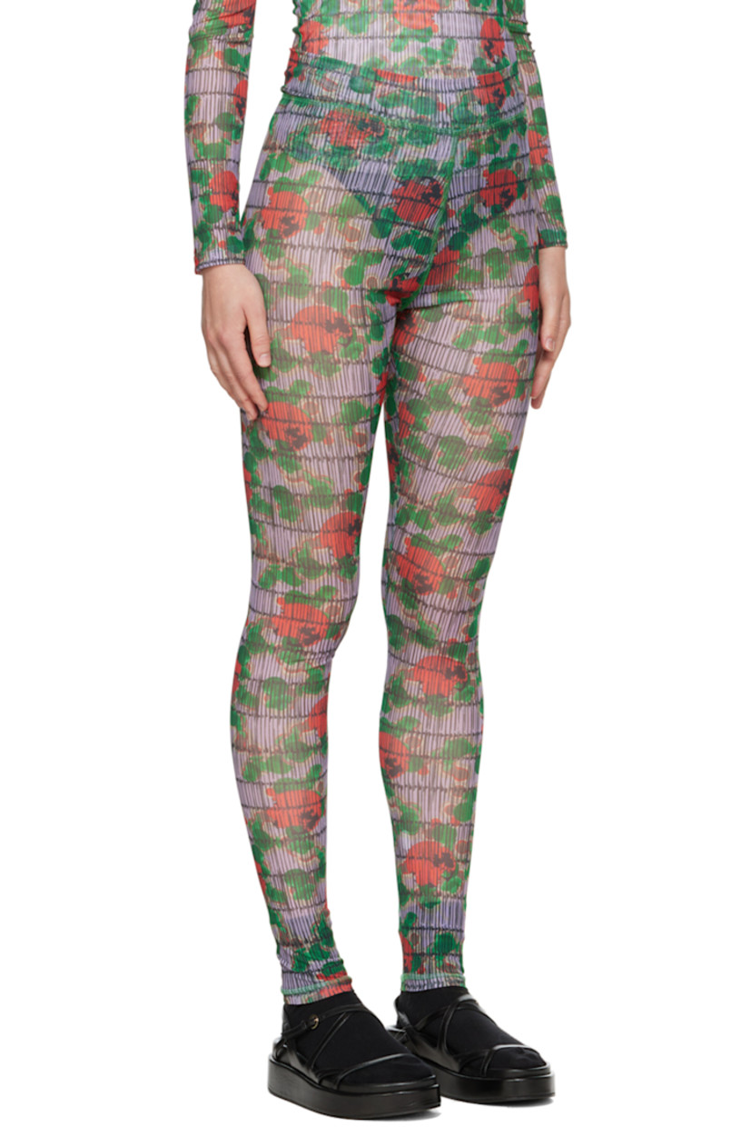 Semi-sheer stretch recycled polyester mesh leggings. Polka dot pattern printed throughout.

Supplier color: Dots turquoise/Red