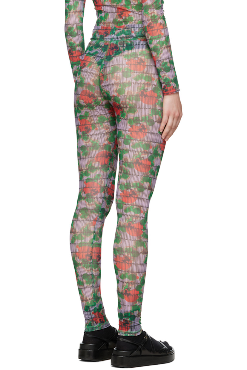 Semi-sheer stretch recycled polyester mesh leggings. Polka dot pattern printed throughout.

Supplier color: Dots turquoise/Red