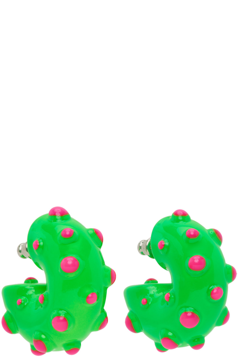 Pair of enameled open hoop earrings in green. Enameled pink studs throughout. 

· Post-stud fastening 
· Palladium-plated brass hardware
· D1"

Supplier color: Green