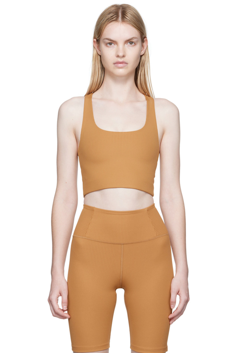 Stretch rib knit recycled polyester sport bra.

· Scoop neck
· Racerback 
· Elasticized hem
· Full jersey lining

Supplier color: Toffee