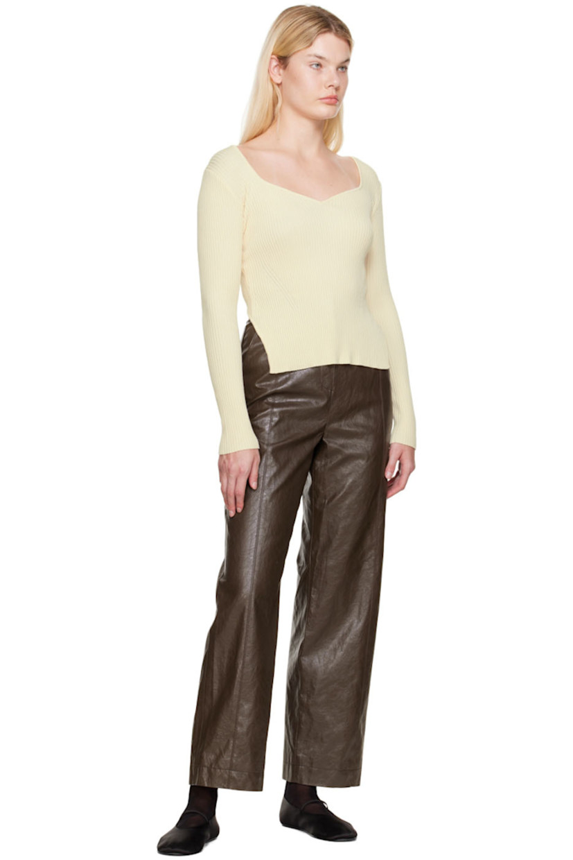 Straight-leg grained faux-leather pants. 

· Paneled construction 
· Three-pocket styling
· Zip-fly
· Full satin lining

Supplier color: Brown