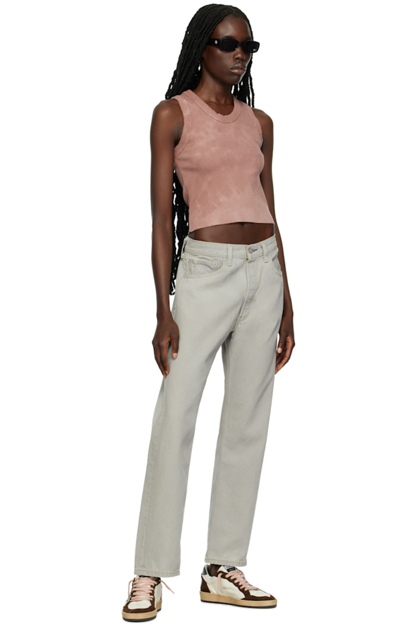 Garment-dyed rib knit stretch recycled cotton tank top. Fading throughout.  

· Scoop neck 
· Raw edge at hem 

Each item is unique. Please note that coloration may vary.

Supplier color: Earth