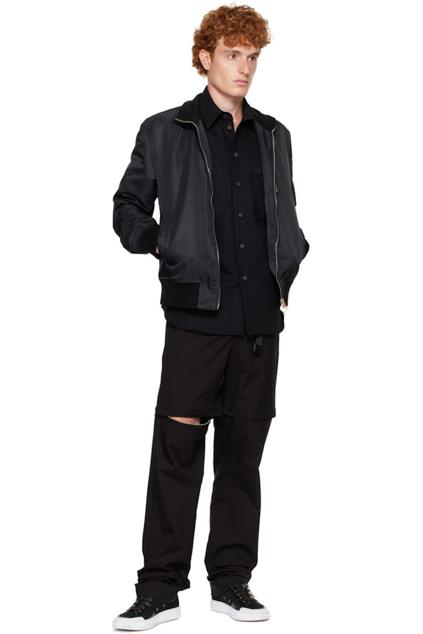 Cotton twill shirt. 

· Spread collar
· Button closure
· Patch pockets 
· Shirttail hem

Supplier color: Black