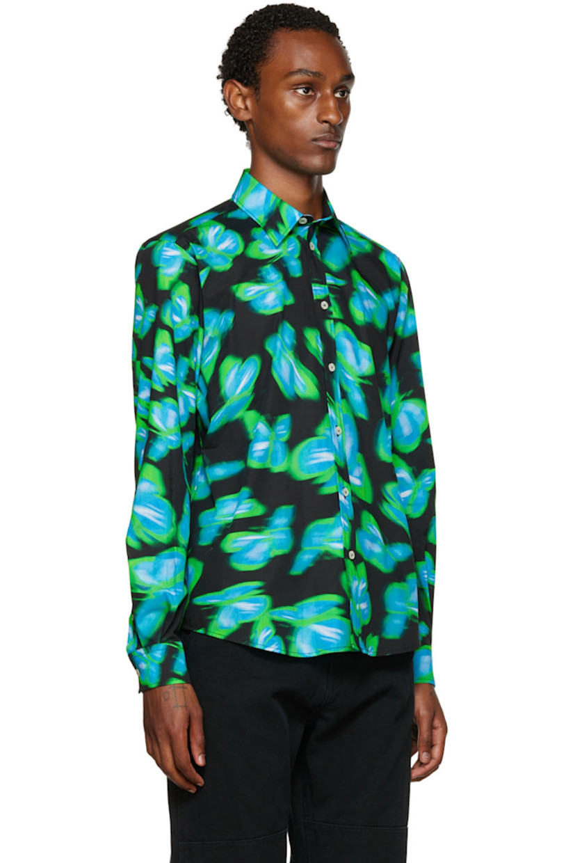 Plain-woven cotton shirt. Graphic pattern printed throughout.

· Spread collar
· Button closure
· Textile logo flag at back collar
· Two-button barrel cuffs
· Shirttail hem
· Mother-of-pearl hardware

Supplier color: Green