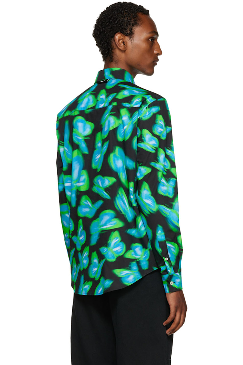 Plain-woven cotton shirt. Graphic pattern printed throughout.

· Spread collar
· Button closure
· Textile logo flag at back collar
· Two-button barrel cuffs
· Shirttail hem
· Mother-of-pearl hardware

Supplier color: Green