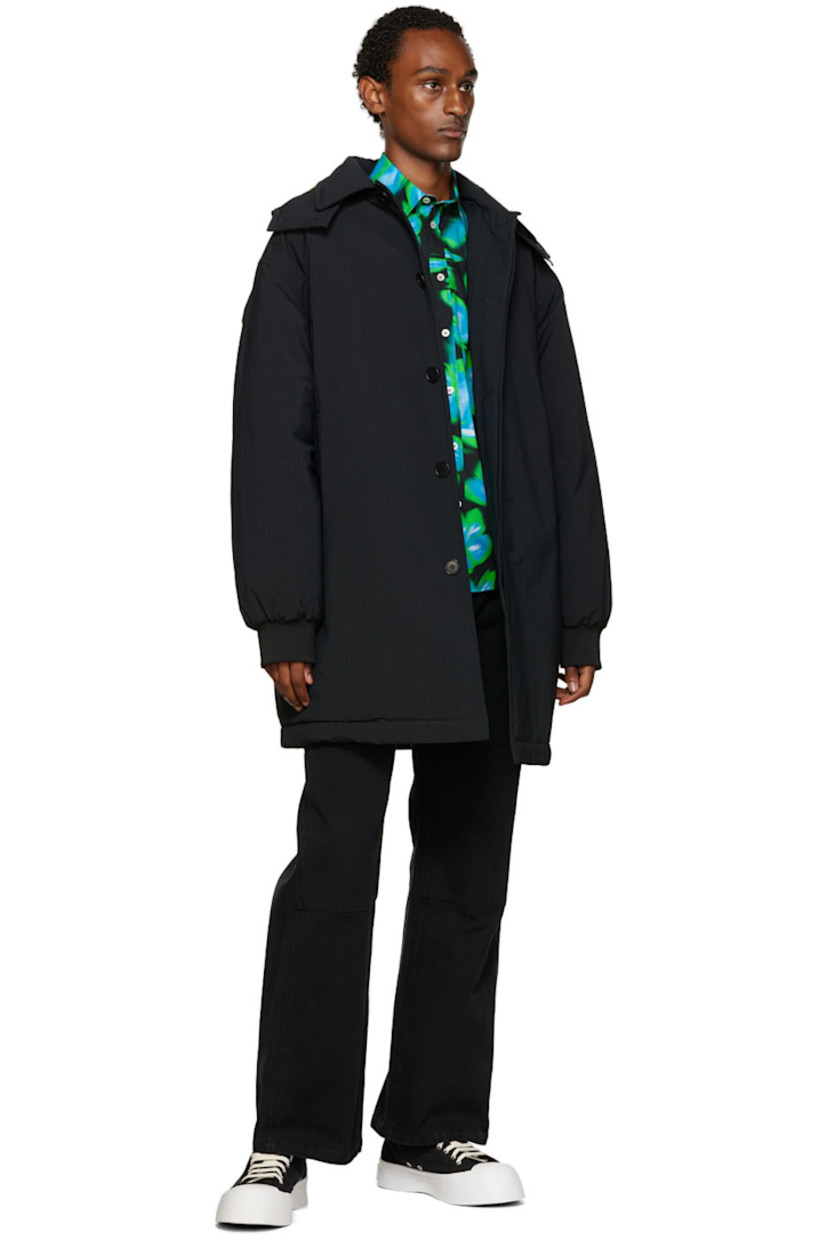 Plain-woven cotton shirt. Graphic pattern printed throughout.

· Spread collar
· Button closure
· Textile logo flag at back collar
· Two-button barrel cuffs
· Shirttail hem
· Mother-of-pearl hardware

Supplier color: Green