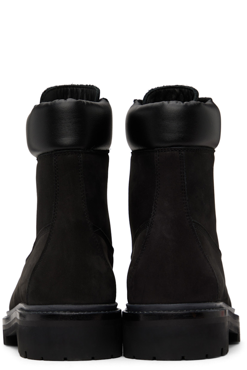 Ankle-high nubuck boots in black.

· Lace-up closure
· Padded buffed leather collar
· Leather lining
· Stacked leather midsole
· Treaded rubber outsole
· Gold-tone hardware

Supplier color: Black