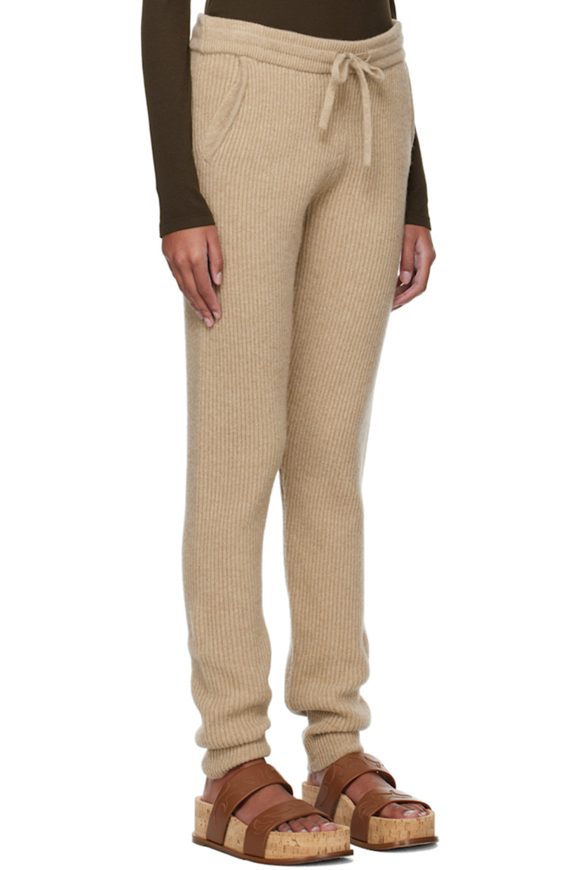 Rib knit recycled wool lounge pants.

· Drawstring at elasticized waistband
· Two-pocket styling

Supplier color: Beaver