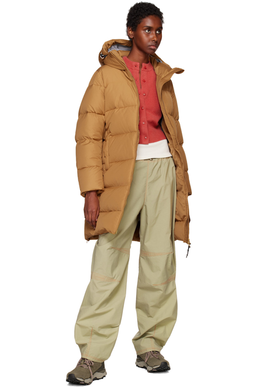 Quilted recycled polyester taffeta recycled down-filled jacket. 

· Bungee-style drawstring at hood
· Stand collar
· Two-way zip closure
· Welt pockets at waist
· Reflective logo printed at cuff
· Full satin lining

Supplier color: Brown sugar

Fill: 100% recycled down.