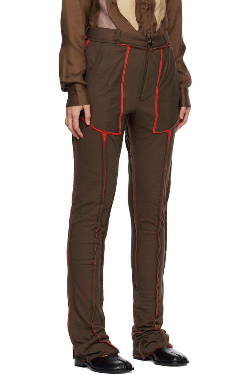 Cotton double jersey lounge pants. Exposed seams with raw edges throughout.

· Belt loops
· Four-pocket styling
· Button-fly

Supplier color: Brown/Red