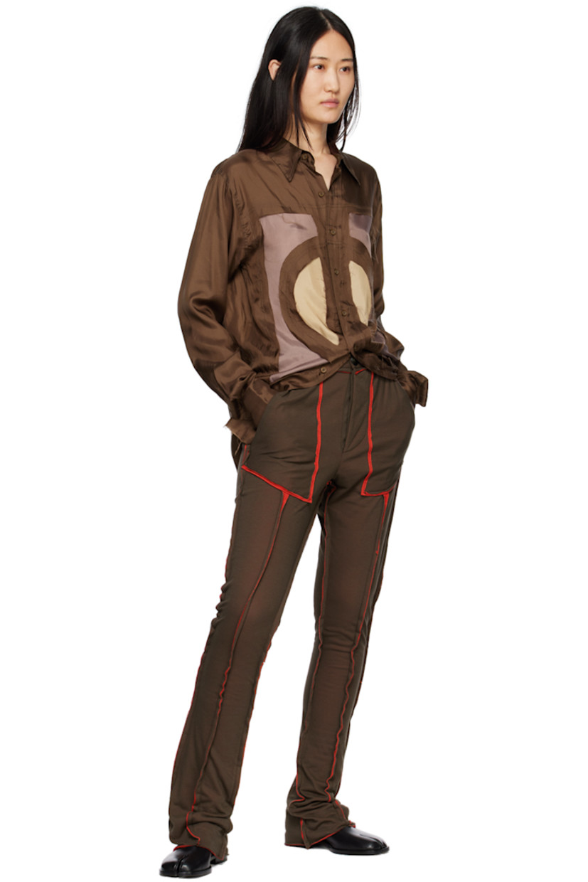Cotton double jersey lounge pants. Exposed seams with raw edges throughout.

· Belt loops
· Four-pocket styling
· Button-fly

Supplier color: Brown/Red