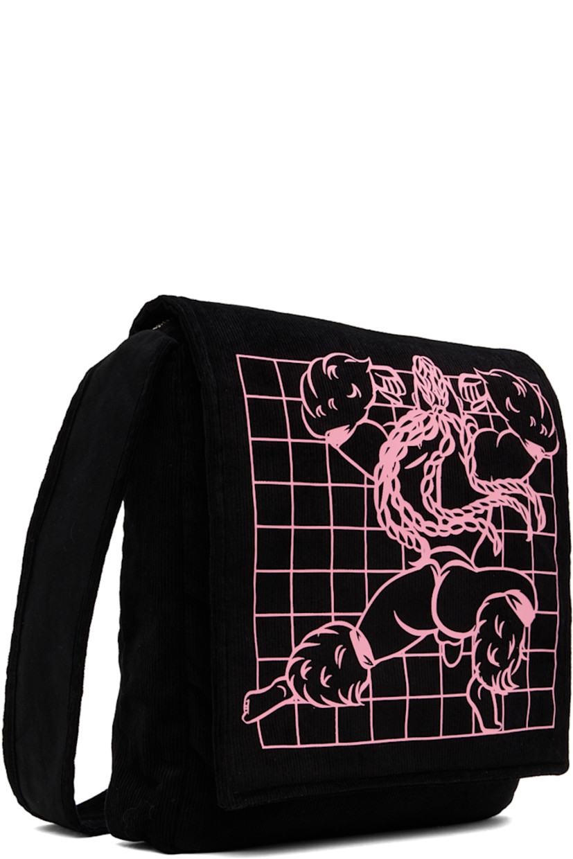 Stretch cotton corduroy shoulder bag in black. Logo graphic embroidered at foldover flap and face.

· Fixed shoulder strap
· Zip closure  
· Concealed zip pocket at interior 
· Plain-woven cotton lining in black
· H13 x W11 x D2 in

Supplier color: Black
